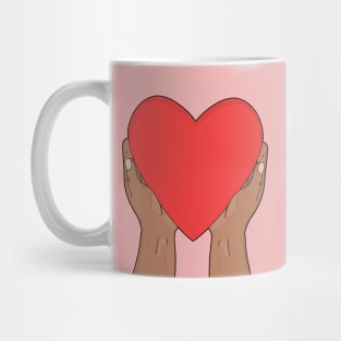 Heart in hands Mug